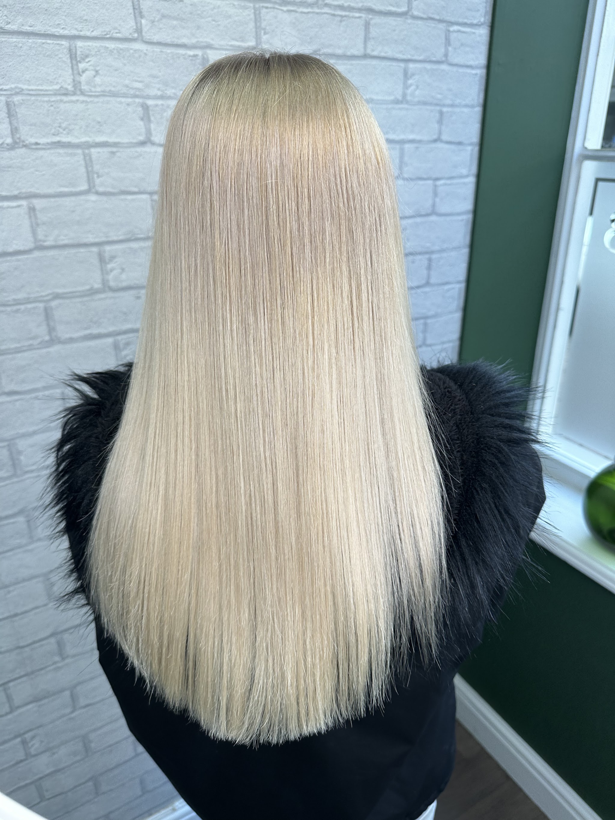 Long, sleek ice blonde hair