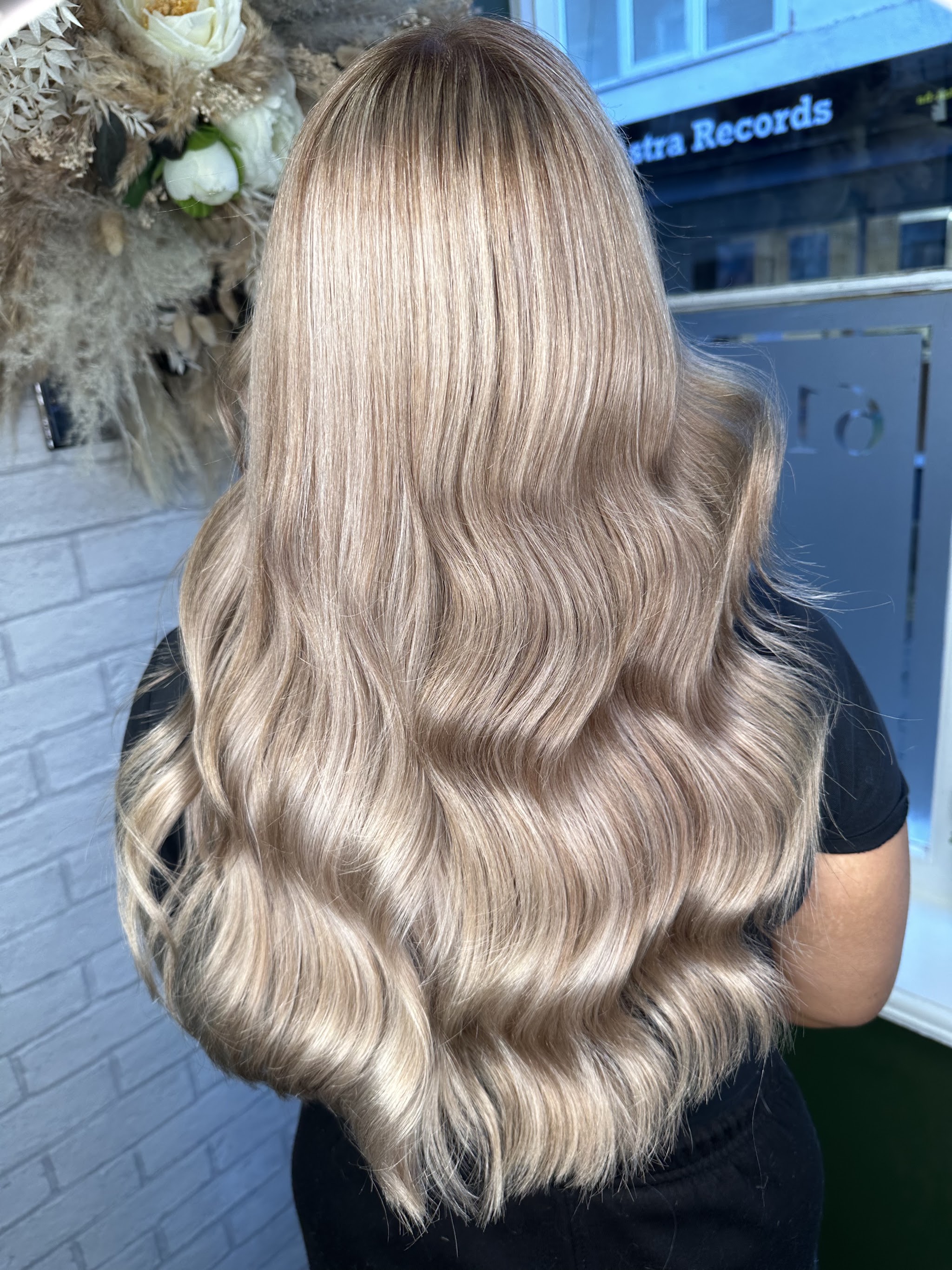 Long blonde waves finished at Studio 16